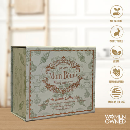 Evergreen Moments gift box by Mom Bomb – green and gold holiday-themed bath bomb collection with four handcrafted bombs