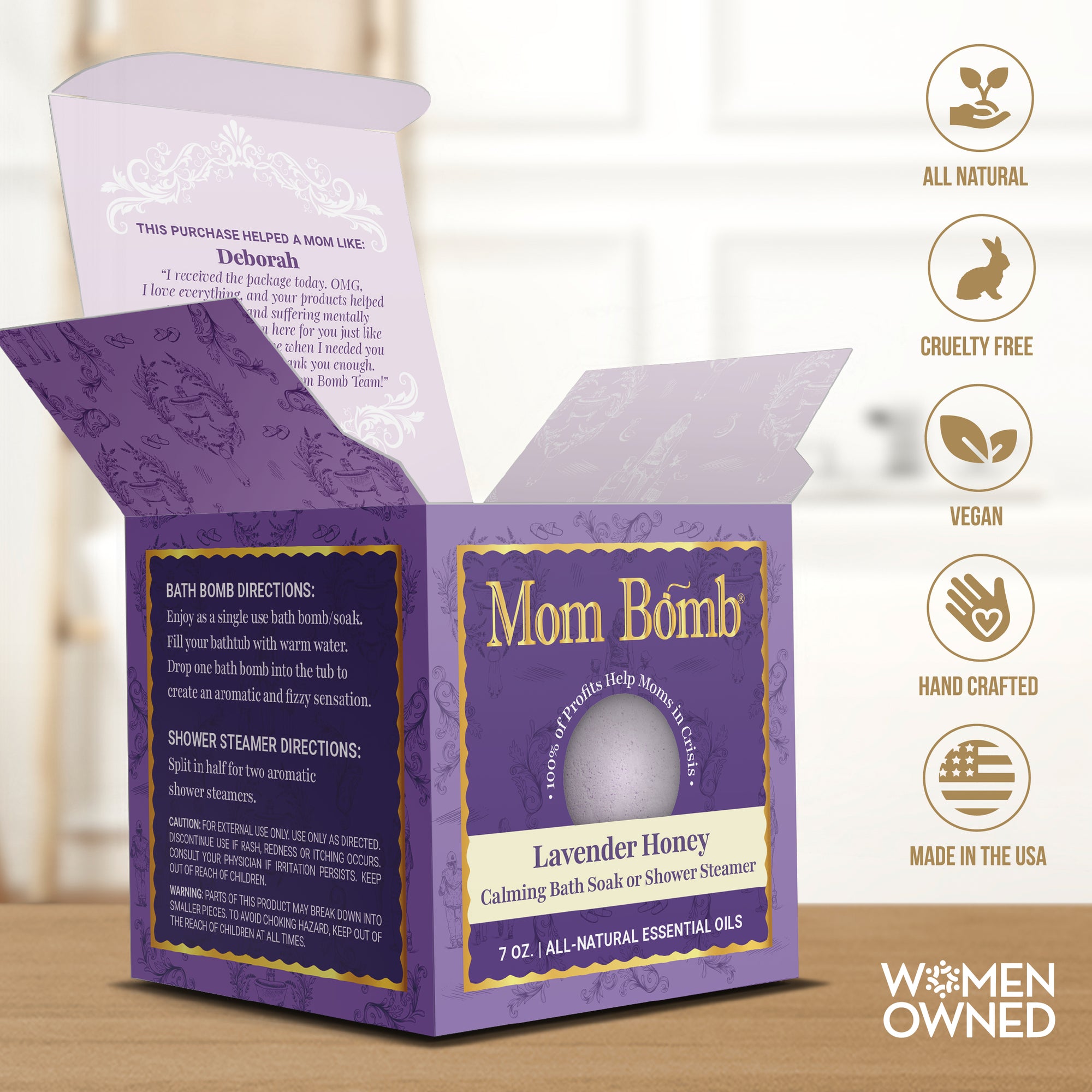 Close-up of Lavender Honey Bath Bomb in open packaging showing directions and women-owned certifications.